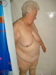 Big boobs granny at home enjoys a lot of fun