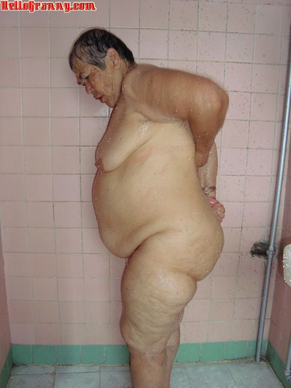 Old amateur lady is shower