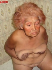 Painted granny plays with her boobs